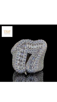 Ring Size Details : Ring Size      : 4 US to 12 US  Ring Weight : 29 gm Approx Diamond Details : Diamond Type : Cubic Zirconia  / Moissanite Diamond Quality : VVS  Diamond Color    : D (Colorless) Diamond Weight : 1ct Baguette / 8.5ct Round Diamond Shape  : Round / Baguette  Diamond Cut       : Excellent Ring Metal Details : 925 Sterling Silver Ring Condition : Total New Product Customization Of  Metal/Diamond Type/Diamond Color/Polish Is Available Feel Free To Ask About Making Your Own Customized (2D/3D) Jewelry Or Any Other Query 𝐂𝐮𝐬𝐭𝐨𝐦𝐢𝐳𝐚𝐭𝐢𝐨𝐧 𝐒𝐞𝐫𝐯𝐢𝐜𝐞𝐬 ➺ I'm glad to make custom jewelry using this diamond within 5-7 business working days.       please feel free to contact me for more. ➺ If you have your Special Requirement or Customized Bulk Orders or wanted any type Silver Diamond Jewelry For Birthday, Anniversary Cubic Zirconia Iced Out Diamond Ring, Iced Out Cubic Zirconia Diamond Ring For Anniversary, Silver-toned Iced Out Diamond Ring For Wedding, Anniversary Iced Out Diamond Ring In Fine Jewelry Style, Anniversary Iced Out Diamond Ring, White Diamond Ring With Bling For Anniversary, Silver Jewelry With Prong Setting For Birthday, Diamond White Iced Out Rings For Anniversary