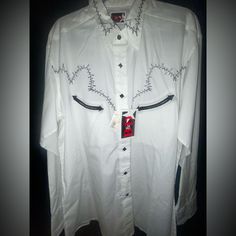 100% Cotton Button Up Embroidered Made In Texas Part Of The Brooks & Dunn Collection Released By Panhandle Slim Nwt. Still Has The Collar Shaper In Tact. White Long Sleeve Shirt For Rodeo, White Western Button-up Top, White Western Shirt For Spring, Western Style White Shirt For Spring, White Western Style Shirt For Spring, Western Style White Embroidered Top, White Embroidered Western Top, White Shirt For Rodeo In Spring, White Fitted Top For Rodeo