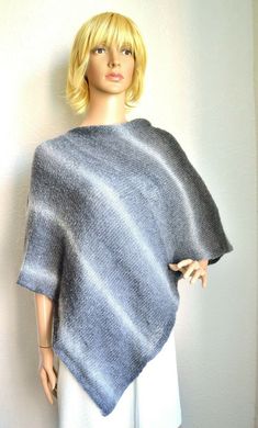 Gray tones, women's poncho handmade from soft, light and little bit fluffy mohair yarn. Warm and cosy. This long poncho will warm you up in chilly evening. Edge facings accurately decorated by hand with crochet hook. Accurately knitted from high quality yarns, so, poncho is durable and easy to maintain. Size: universal, length 58'' (148cm), width 25'' (64cm). Fiber: 28% mohair - 31% polyacrylic - 41% polyamid yarns. Care: hand wash at 30 degrees C. - lay flat to dry. Long Poncho, Womens Poncho, Cute Alpaca, Snood Scarf, Winter Shawl, Ladies Poncho, Scarf Women Fashion, Mohair Yarn, Merino Wool Yarn