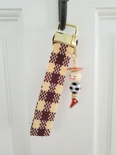 a key chain hanging on a door handle