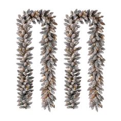 two christmas garlands with lights hanging from the top and bottom, one in silver tinsel