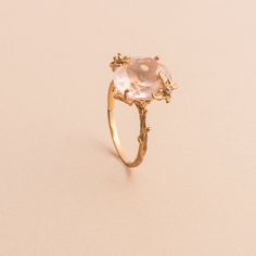 Say hello to our fan favorite! The delicate floral details on this ring surrounds the stunning oval cut rose quartz to set a statement you didn't know you needed. Approximate stone measurement: 3/8” x 1/2” Finish: 18k rose gold plated Material: sterling silver, genuine rose quartz gemstone Item #: 13056 FAIRPRICING $130 TOORIGINAL | $170 ESTIMATED RETAIL All of our items are priced specially while keeping the same high standard quality. Rose Quartz Flower Ring, Cheap Rose Gold Round Crystal Ring, Rose Quartz Jewelry Rings, Rose Gold Ring With Rose Quartz, Luxury Rose Gold Rose Quartz Jewelry, Gold In Quartz Ring, Rose Quartz Wedding Ring Raw, Rose Quartz Rose Gold Engagement Ring, Luxury Gold Rose Quartz Jewelry