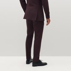 The Men’s Burgundy Suit Pants are here to help you stand out from the crowd at your next event. A dark, nuanced red color makes for the perfect maroon slacks. Our men’s burgundy dress pants are a bold choice that remains anchored firmly in the classic and classy. Made with a luxe, stretch-fit fabric that keeps you looking sharp and feeling comfortable all day, these burgundy slacks are men’s modern suiting update. Pair with the Men’s Burgundy Suit Jacket for a sleek 2-piece suit, or style the su Classic Fitted Burgundy Bottoms, Tailored Red Dress Pants For Formal Occasions, Formal Burgundy Trousers, Red Full Length Formal Dress Pants, Fitted Burgundy Pants For Work, Classic Formal Red Pants, Formal Red Bottoms With Welt Pockets, Classic Red Formal Pants, Red Formal Bottoms With Welt Pockets