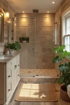 a bathroom with a tub, sink and shower in it's own area next to a window