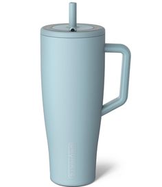 a blue coffee cup with a lid and handle on the side, sitting in front of a white background