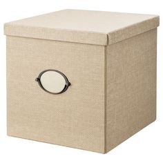 a beige storage box with a black handle