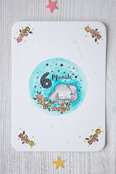 a card with an elephant on it and stars around the edges that says, momale