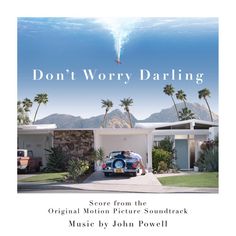 the cover of don't worry daring by john powell, featuring an old car in front of a house