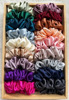 Choose our most luxurious and stylish scrunchies for you and your loved ones. Materials: - Charmeuse satin silk fabric - a type of mulberry silk that has a satin finish.  Charmeuse silk is very gentle and soft for all hair types and its satin finish creates a modern and luxurious look - 6mm elastic band - 6~7 inches long Actual colors may differ slightly from those in the pictures. Size:  Regular ~ 1.5 inches; wraps hair 2-3 times Handmade in Canada. NOTE: Pure silk is made from a natural protein-fiber obtained from the larvae of the mulberry silkworm; it has a tendency to wrinkle depending on the variety.  Please try to keep your silk scrunchies away from water or wet hair. Diy Hair Scrunchies, Scrunchie Styles, Mindful Moments, Hair Tie Accessories, Mulberry Silk Fabric, Teacher Personalized, Velvet Scrunchie, Hair Accessories Collection, Natural Protein