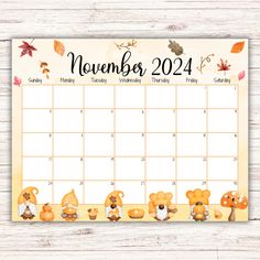 a november calendar with teddy bears and leaves