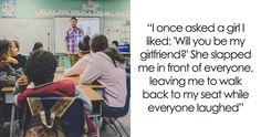 a group of people sitting at desks in front of a whiteboard