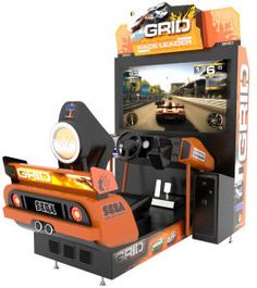 an orange and black video game machine with the screen on it's display stand