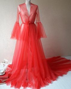 Fitted Organza Dress With Long Train, Fitted Floor-length Tulle Gown, Sheer Fitted Prom Gown, Long Sleeve Tulle Dress With Sweep Train, Tulle Long Sleeve Dress With Sweep Train, Fitted Tulle Dress With Sheer Sleeves, Fitted Organza Gown With Sweep Train, Red Fitted Organza Gown, Sheer Long Wedding Dress