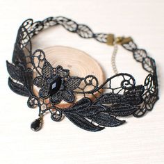 A beautiful Black Lace Choker Necklace Gothic style hand made with unique elaborate floral Victorian design. A wonderful piece to match your dress for work or evening gowns for special occassion. Handmade Black Gothic Choker, Adjustable Black Flower Jewelry, Black Victorian Choker Necklace, Victorian Style Black Jewelry For Party, Black Flower Choker As A Gift, Elegant Handmade Black Choker, Black Flower-shaped Jewelry For Wedding, Black Flower Choker For Gifts, Elegant Black Flower Necklaces