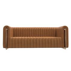 a brown leather couch sitting on top of a white floor