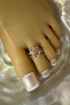 This toe ring features a shiny silver branch that wraps around the toe. Three petite pink crystal flowers and three clear crystal accents sit on the branch that also adorn the toe. This toe ring is size adjustable and one size fits most. Comfortable and versatile, it will lend itself to casual or formal events. All items are made in a smoke free environment. *If there is any issue with your toe ring, please let me know so that I can correct it. Thanks for visiting my shop!👣 Toes Ring Silver, Columbia Tn, Sterling Silver Toe Rings, 2 Flowers, Ring Crystal, Silver Toe Rings, Ring Flower, Toe Ring, Crystal Flower