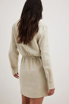 Linen Shirt Dress Chic Collared Linen Dress, Neutral Long Sleeve Shirt Dress For Daywear, Chic Linen Shirt Dress With Button Cuffs, Chic Button-up Linen Dress, Chic Long Sleeve Neutral Shirt Dress, Chic Linen Long Sleeve Mini Dress, Chic Linen Mini Dress With Long Sleeves, Chic Long Sleeve Linen Mini Dress, Chic Long-sleeved Linen Mini Dress