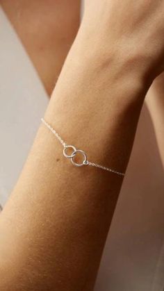 Our sweet Interlocking Circles Bracelet is minimal, modern, and timeless. >> Interlocking Circles Bracelet: https://pinealvisionjewelry.com/products/interlocking-circles-bracelet Minimalist Infinity Bracelet With Adjustable Chain, White Gold Charm Bracelet For Everyday, Elegant Everyday Charm Bangle Bracelet, Elegant Everyday Bangle Charm Bracelet, Everyday Elegant Bangle Charm Bracelet, Minimalist Bangle With Simple Design, Minimalist Charm Bracelet With Adjustable Chain, Minimalist Simple Bangle Jewelry, Simple Bracelets With Adjustable Chain