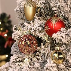 a christmas tree with ornaments hanging from it