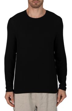 A classic for a reason, this ribbed long-sleeve T-shirt can easily be layered with all of your favorite looks. Crewneck Long sleeves 95% modal, 5% spandex Hand wash, dry flat Made in Peru Black Long Sleeve T-shirt With Ribbed Cuffs, Ribbed Long Sleeve T-shirt For Fall, Black Ribbed Long Sleeve Crew Neck Top, Long Sleeve Crew Neck Top With Ribbed Neckline, Stretch Long Sleeve T-shirt For Layering, Basic Long Sleeve Crew Neck Top For Layering, Black Fine Knit Long Sleeve Crew Neck Top, Solid Color Ribbed Long Sleeve T-shirt, Long Sleeve Solid Ribbed T-shirt