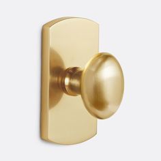 an image of a golden door handle on a white background