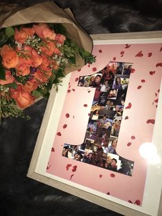 a bouquet of roses and a photo frame with the number one on it