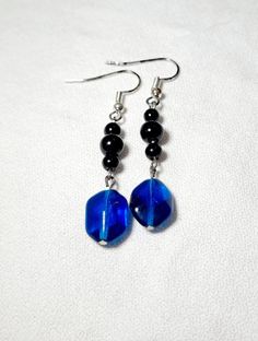 Dangle Earrings Blue and Black are just shy of 2.25 inches long. I rescued these beads from a friend whose store was going out of business. Thought these would be cute for date night, but they'd be perfect anytime. Blue Dangle Earrings With Black Beads, Adjustable Blue Earrings With Black Beads, Blue Dangle Jewelry With Black Beads, Going Out Of Business, Long I, Earrings Blue, Blue And Black, Jewelry Earrings Dangle, Date Night