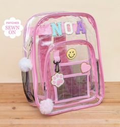 Welcome to Noa Jayne Co where we specialize in personalized backpacks for kids and toddlers! All backpacks are fully customizable and come with sewn on patches to ensure long lasting durability. Our backpacks are perfect for daycare, school, traveling, and make for the cutest diaper bag. The perfect personalized gift for kids!  Our custom clear backpacks come in the colors pink, purple, and black, have thick straps, and are built to last! They are made with the highest quality materials and all Clear Backpack For Back To School, Affordable Personalized Backpack For Back To School, Customizable Multicolor Bag For Back To School, Clear Backpack Personalized, Pink Clear Backpack, Homecoming Campaign, Clear Backpacks, Cute Diaper Bags, Beaded Sunglasses