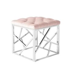 a white stool with pink velvet seat pad and metal frame structure on an isolated background