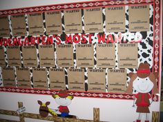 a bulletin board that has been decorated with cowgirls and cowboy hats on it