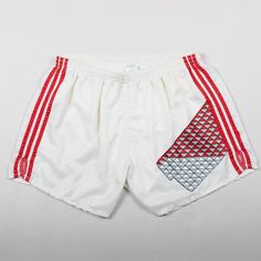 1970s  Adidas Vintage shorts in white Rare piece CONDITIONS: Good vintage conditions  SIZE: Size Large Waist 38 cm Leg length 33 cm Retro White Short Bottoms, Vintage White Bottoms For Summer, Vintage White Summer Bottoms, Retro White Bottoms For Summer, White Retro Bottoms For Summer, Retro White Summer Bottoms, White High-waisted Athletic Shorts For The Beach, White High-waisted Athletic Shorts For Beach, White Retro Summer Bottoms