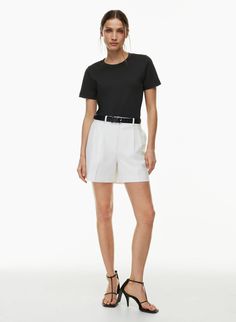 PLEATED MID-THIGH SHORT | Aritzia Fitted Pleated Waist Shorts For Work, Classic Workwear Shorts With Short Leg, Elegant Fitted Shorts With Pleated Waist, Elegant Fitted Pleated Waist Shorts, Pleated Waist Short Workwear Bottoms, Classic High-waisted Bermuda Shorts With Relaxed Fit, Pleated Waist Short Bottoms For Workwear, Workwear Bottoms With Pleated Waist And Short Length, Classic High-waisted Bermuda Shorts