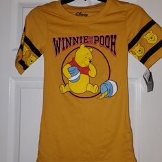 Disney Baseball Tee With Winnie-The-Pooh. Junior X Small With Defects. Please See Pictures Obo Sporty Mickey Mouse Crew Neck Top, Sporty Tops With Character Print For Fans, Playful Short Sleeve Top For Fan Merchandise, Disney Fan Merchandise Top, Pre-shrunk, Playful Tops With Character Print For Fan Merchandise, Disney Short Sleeve Tops For Fan Merchandise, Disney Fan Merchandise Short Sleeve Tops, Disney Letter Print Tops For Streetwear, Disney Graphic Print Tops For Fan Merchandise