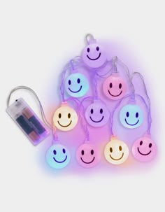 a group of smiley face lights with batteries