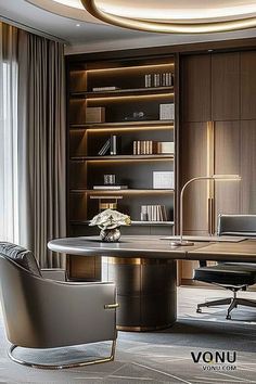 an office with a round table and chairs in front of a bookcase filled with books