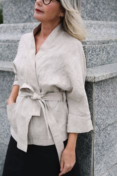 "Elevate your wardrobe with our Linen Belted Kimono Jacket featuring pockets. This versatile duster coat embodies effortless style and comfort, with a relaxed fit and deep front pockets. The ¾ sleeves add a casual touch, perfect for any look. Handmade from high-quality linen, it's a staple for all seasons. Easy to match and wear, this jacket complements various styles.  JACKET DETAILS ⚬ Kimono cut. ⚬ 3/4 sleeves. ⚬ Deep pockets. ⚬ Made of washed organic Oeko-Tex certified linen. ⚬ The linen is N Linen Coat Women Casual, Kimono Linen, Linen Kimono Jacket, Classic Oversized Linen Outerwear, Elegant Oversized Linen Outerwear, Linen Coats Women, Linen Jackets Women, Unstructured Linen Single-breasted Outerwear, Single-breasted Linen Outerwear With Collar