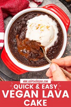 a person scooping ice cream out of a chocolate cake in a red bowl with the words, quick and easy vegan lava cake