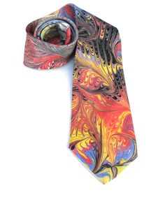 "Silk tie in red, yellow, blue and black. Free-flowing abstract design, made with a marbling process. Marbling is an centuries old craft originating in Asia. Colours are floated upon a solution, manipulated with various tools and then transferred to fabric, paper or wood. The resulting designs are free-flowing, unusual and can resemble many organic patterns. Of course no two patterns will be exactly the same, each tie is unique. 4\" wide at the widest part. Although the colours are not affected Multicolor Neckwear As A Gift, Adjustable Multicolor Standard Tie, Adjustable Multicolor Neckwear For Gift, Crinkle Scarf, Orange Scarf, Organic Pattern, Acrylic Fabric, Silk Necktie, Stone Pattern