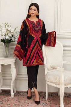 Show details for Ethnic Black Black Cotton Kurta For Spring, Black Cotton Lawn Suit For Summer, Traditional Black Lawn Suit For Spring, Black Sets With Embroidered Sleeves For Festive Occasions, Black Festive Set With Embroidered Sleeves, Festive Black Set With Embroidered Sleeves, Cotton Dabka Top For Eid, Black Designer Lawn Suit With Long Sleeves, Black Blouse With Resham Embroidery For Eid