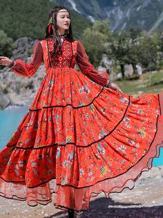 Retro ethnic style women's dress long sleeve midi dress

	
		
			Size/cm
			Lenght
			Shoulder
			Chest
			Sleeves
		
		
			M
			122
			37.5
			99
			57.5
		
		
			L
			123
			38.5
			103
			58.5
		
		
			XL
			124
			39.5
			107
			59.5 Winter Bohemian Maxi Dress, Bohemian Maxi Dress For Winter, Red Long Sleeve Bohemian Maxi Dress, Festive Red Long Sleeve Maxi Dress, Folk Style Long-sleeved Floral Print Dress, Bohemian Long Sleeve Dresses For Fall, Folk Style Long Sleeve Floral Print Dress, Festive Long Sleeve Folk Dress, Long Sleeve Boho Dress With Floral Print For Fall