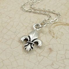 Fleur De Lys Necklace, Silver Fleur De Lis Charm on a Silver Cable Chain Dainty Silver Charm Necklace 16 Inch, Silver Dainty Charm Necklace 16 Inch, Classic Silver Charm Necklaces, Classic Silver Nickel-free Charm Necklaces, Classic Silver Nickel-free Charm Necklace, Necklace Silver, Cable Chain, Gift Boxes, Shopping Cart