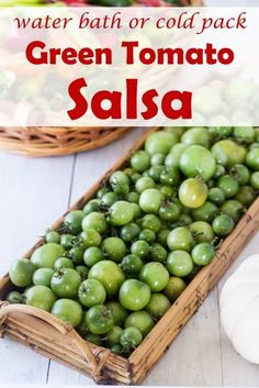 green tomatoes in a basket with text overlay that reads water bath or cold pack green tomato salsa