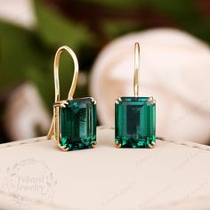 "❤Jewelry Details -Gold Type : Solid 10K Gold / Solid 14K Gold / Solid 18K Gold (Choose One in Material Option) -Center Stone: Lab Created Emerald 8*10mm, Approximately 3.24ct*2pcs Color: Green--- 5A Clarity: VVS Cut: Emerald Cut / 3EX Earring Width: 8mm Earring Length: 18.5mm SKU: YE0057 ❤The link for the same style pendant is https://www.etsy.com/listing/1213553322/810mm-emerald-cut-green-emerald-pendant?click_key=35981e9b503496c0a784e098aa220ab0483f5f23%3A1213553322&click_sum=ec1082a3&ref=shop_home_active_2&pro=1&frs=1&sts=1 ~*-*~Purchase Guarantee: - All our jewelry is handmade, and each process is refined. - 14 Day Refund Guarantee. - All our products are Free Shipping. - Free Gift Box&Packing. ~*-*~Please contact us if you need service: 1. Ring Resizing. 2. Metal Change(PT950/10k/14k Emerald Green Earrings Gold, Emerald Cut Emerald Earrings, Emerald And Gold Earrings, 14k Gold Green Earrings With Ear Wire, 14k Gold Drop Bridal Earrings As Gift, 14k Gold Bridal Drop Earrings For Gift, Anniversary Bridal Earrings In Yellow Gold, Anniversary Yellow Gold Bridal Earrings, Green 14k Gold Wedding Earrings