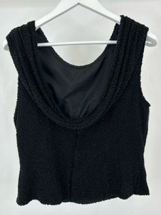 NWT. By Sean Collection. Vintage. Beaded across entire shell. Draped neckline. Sleeveless. Back draped fabric with 2 snap closes. Hidden back zip. Lined. Shell: 100% Silk. Lining: Polyester blend. Dry clean. Made in India. Brand = CECILY BROWN Women Size = XL Color = Black Item Number: 1821-157 Item ID: 376546 Category: Top Embellished Sleeveless Evening Vest, Evening Embellished Sleeveless Vest, Stretch Sleeveless Lined Tops, Sleeveless Lined Party Top, Cecily Brown, Draped Neckline, Brown Women, Draped Fabric, Affordable Clothes