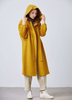 DETAILS: * 50% wool, 50% fiber,nylon * Has no lining * the model is 172 cm high and the model is wearing the coat in XS. * color in the picture show. * A big hood with a long tie at the neck . * No buttons. * Two pockets in seam. * Below knee length. * Dry clean. ★★ Custom order selection, Will charge 20USD-70USD custom fees Request Chang the Length Request Chang the sleeve length Can't find your size Your height is not between 155cm- 175cm Your weight is not between 47kg -77kg ★★ Get your size Mustard Coat, Long Wool Coat Women, Mantel Cape, Plus Size Coat, Green Wool Coat, Wool Cape Coat, Winter Coat Women, Coat Plus Size, Princess Coat