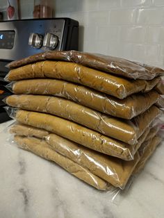 a stack of food bags sitting on top of a counter