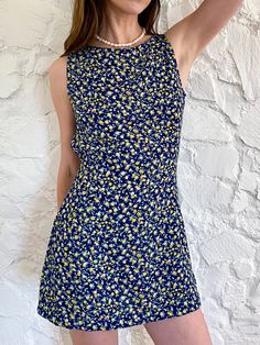 This short shift dress has shape but is loose and flirty and comfortable. Wear it with heels, or over a bathing suit, it's easy-breezy. This one is a thin and swishy blue and yellow poly blend. All our fabrics are upcycled deadstock. Dry-clean only. Short Shift Dress, School Clothes, The Shift, Shopping Ideas, Easy Breezy, Blue And Yellow, Spring Floral, School Outfits, Hip Length