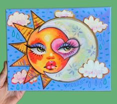 a painting of a woman's face with the sun and moon in her eyes