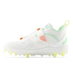 a white shoe with green and orange accents