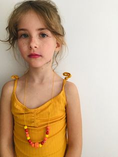 Made by my daughter :) Pretty Swimwear, Brown Beaded Necklace, Yellow Wood, Necklace Orange, Yellow Calcite, Wood Necklace, Stone Pendant Necklace, Orange And Yellow, Gemstone Necklace Pendant